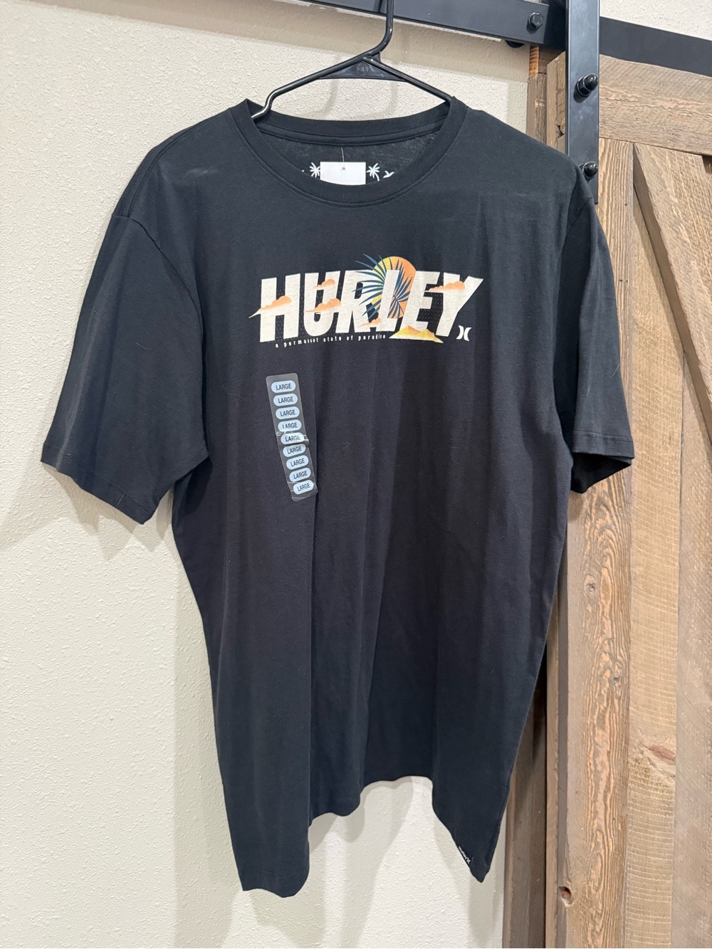 Hurley Black Short-Sleeve Logo Tee with Sunset Accent